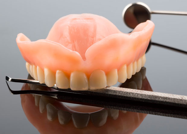 Snap on partial dentures with implants